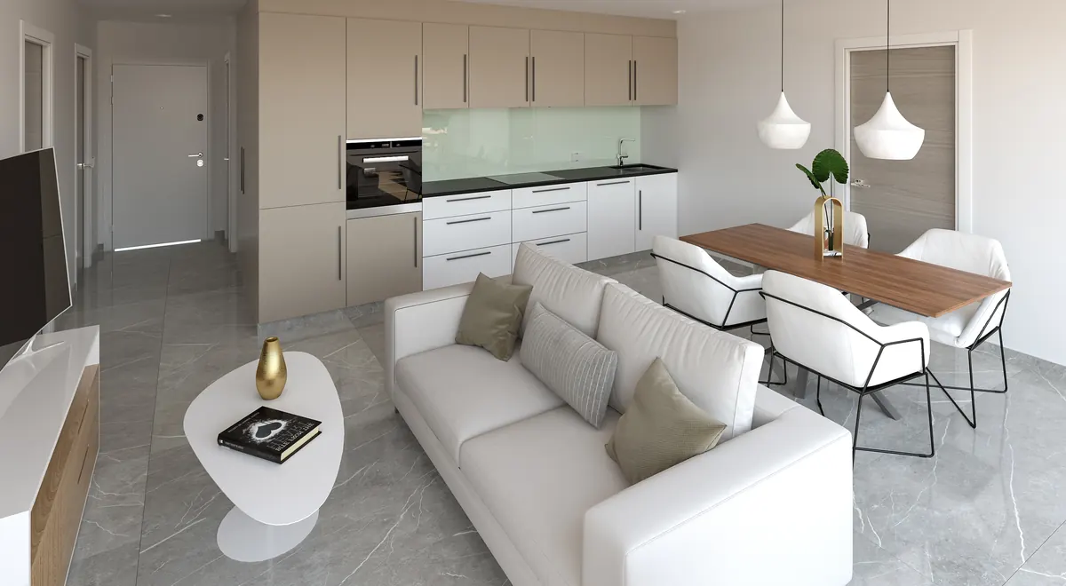 Salón comedor con cocina abierta en apartamento de Xeresa