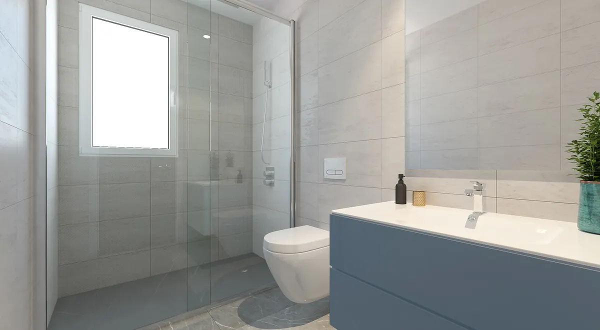 Baño moderno con ducha en apartamento de obra nueva